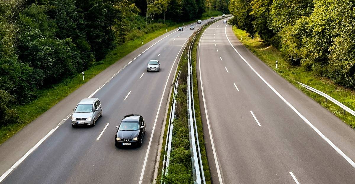Road markings on a road with traffic