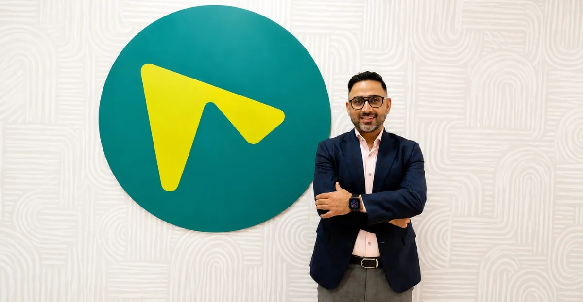 Sachin Dixit standing in front of the Shadowfax logo after being appointed Head of Corporate Development and Investor Relations.