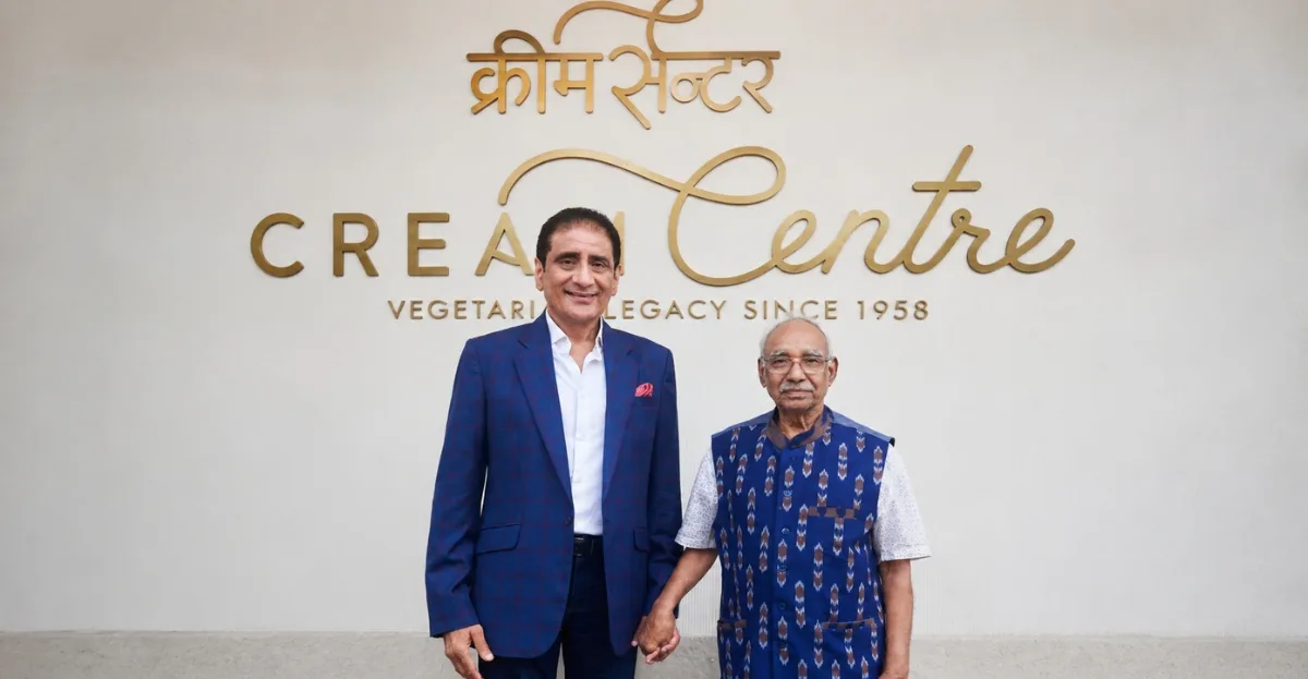Cream Centre Chowpatty celebrates its artistic legacy as Chairman Sanjiv Chona poses with renowned contemporary artist Thota Vaikuntam at the iconic Mumbai restaurant.