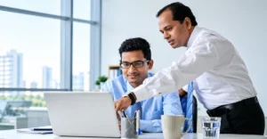 Capgemini employees collaborating in a training session as part of the Capgemini learning culture