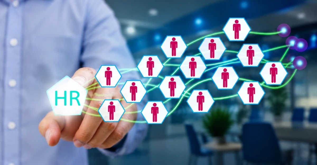 Multi-Agent AI in Recruiting screening resumes alongside a human recruiter reviewing candidates