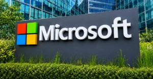Microsoft buyout 2026: employees reviewing the voluntary exit offer at a Microsoft office